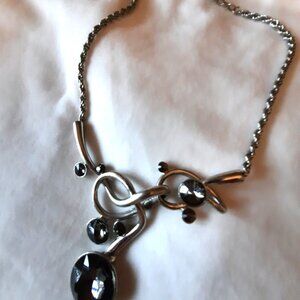 Artistic necklace, faceted smokey grey glass